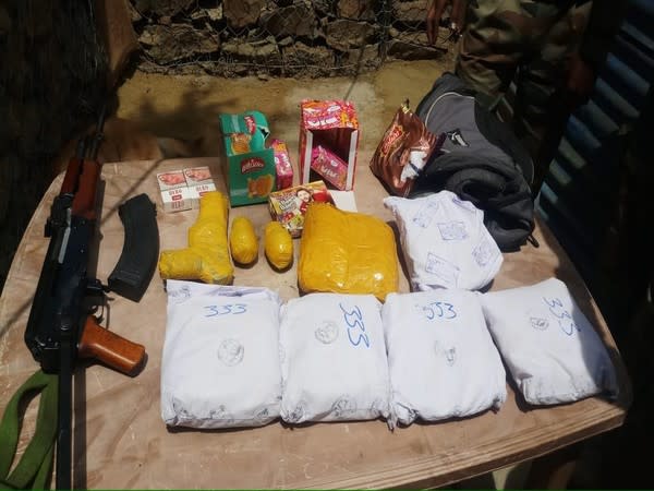 Arms, ammunition and drugs recovered by security forces. (Photo/ ANI)