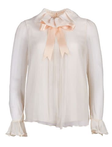 <p>Julien's Auction</p> Princess Diana's pink blouse, which is available during December's Julien's Auction event