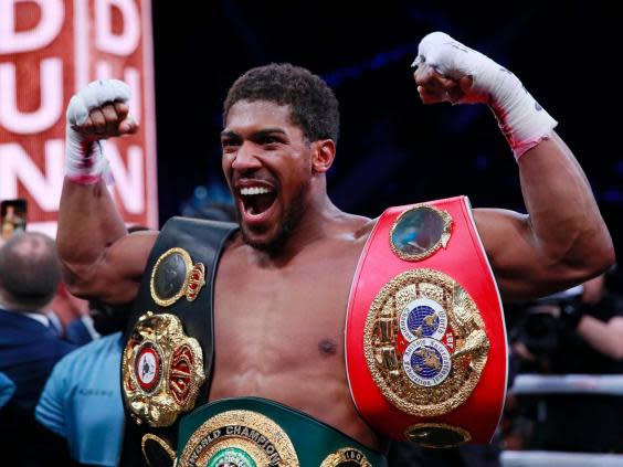 Anthony Joshua holds the remaining three heavyweight belts (Reuters)