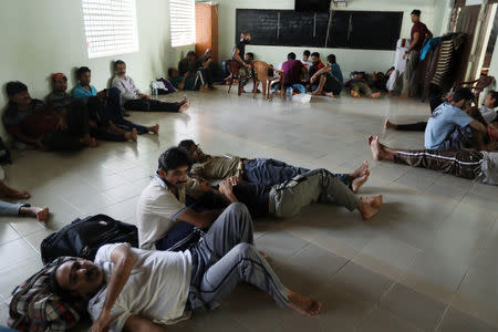 Pakistan refugees rest inside a mosque in Negombo, Sri Lanka, April 25, 2019. REUTERS/Athit Perawongmetha