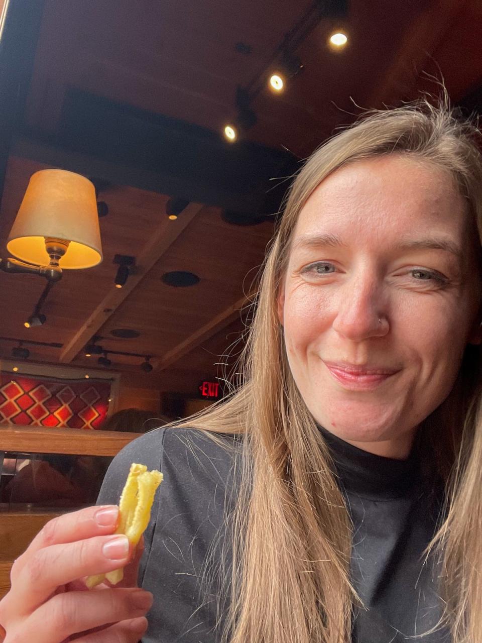 The author eating fries at The White House Tavern.