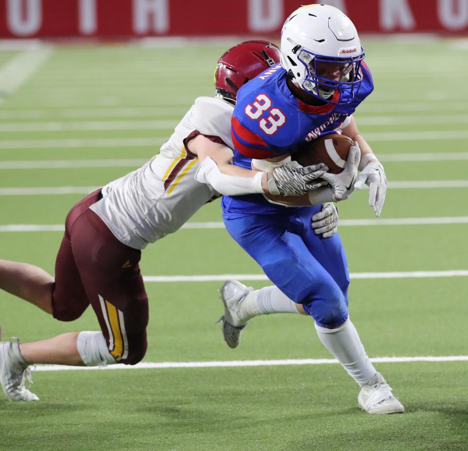 Warner's Charlie Dulany gets ready to score on one his four touchdown runs during the state Class 9A football championship on Thursday, Nov. 9, 2023 in Vermillion's DakotaDome. Warner won 76-54.