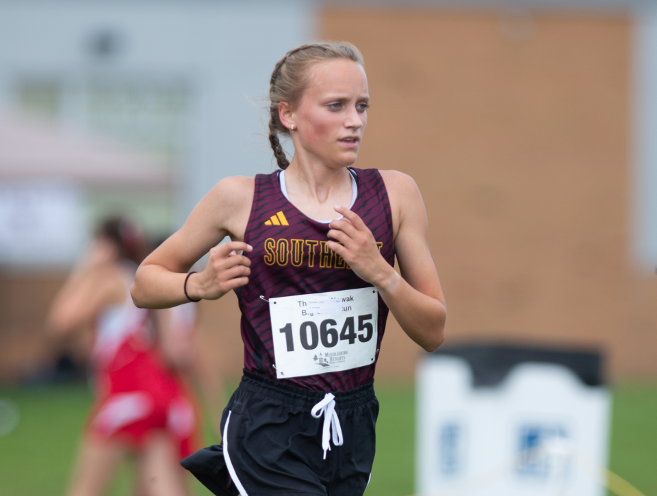 Southeast's Julie Wheeler placed first in 20:14.72 at the Streetsboro Rockets XC Invitational on Saturday.