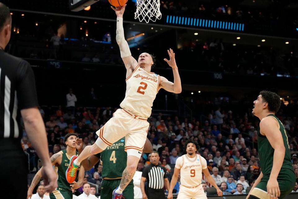 Texas guard Chendall Hunter scores on a layup during Thursday night's 56-44 win over Colorado State. The sophomore came off the bench to spark the Longhorns, finishing with 11 points in 29 minutes.