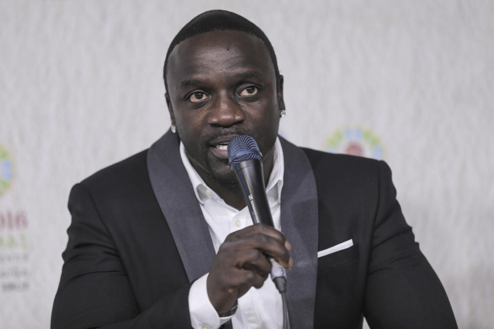 FILE - International music star and co-founder of Akon Lighting Africa, Akon, speaks at a news conference at the Climate Conference, known as COP22, in Marrakech, Morocco, Nov. 14, 2016. The Securities and Exchange Commission said Wednesday, March 22, that Lohan, rapper Akon and several other celebrities have agreed to pay tens of thousands of dollars to settle claims that they promoted crypto investments to their millions of social media followers without disclosing they were being paid to do so. (AP Photo/Mosa'ab Elshamy, File)