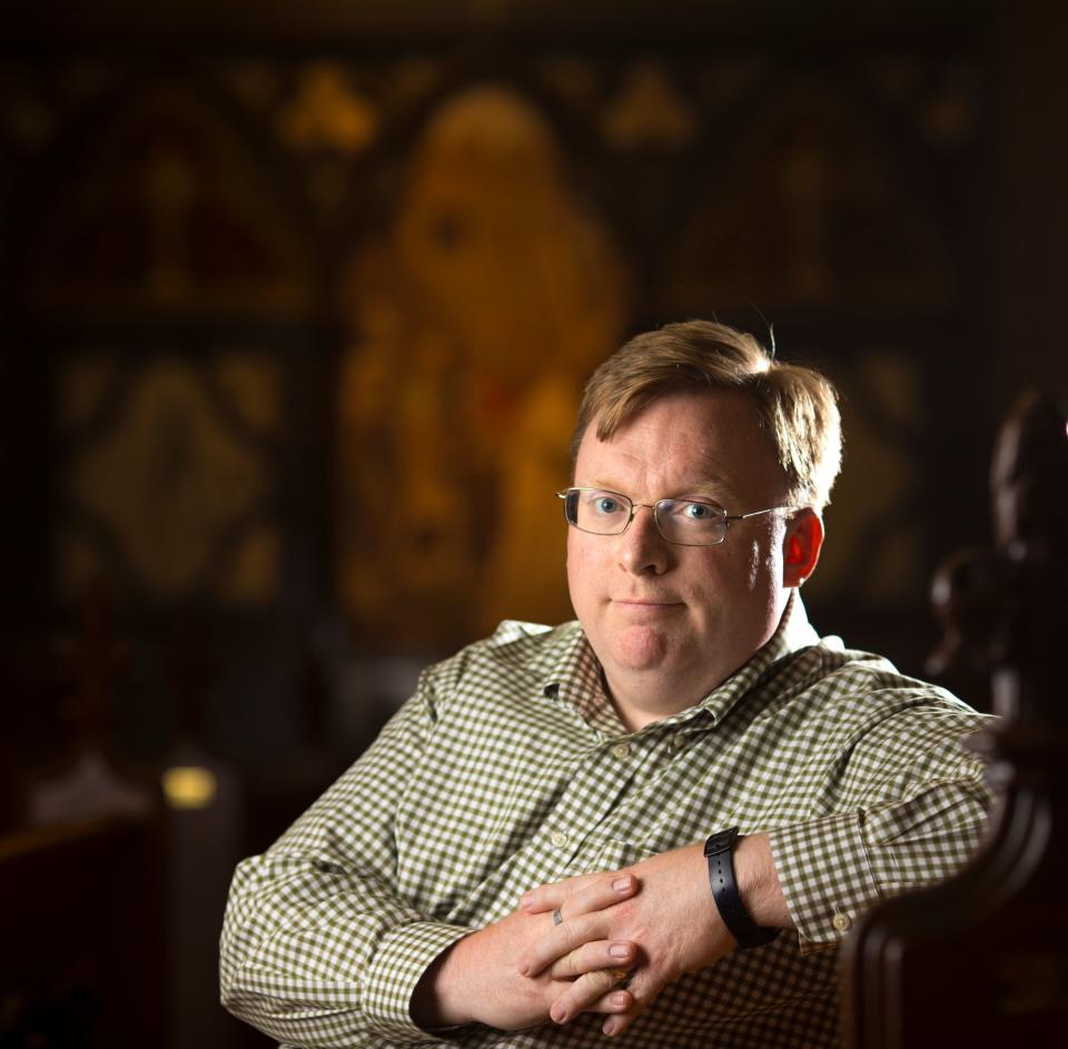 Michael Vanderburgh, director of stewardship at the Archdiocese of Cincinnati, has a new job. He was abused by a priest as a child and now raises millions of dollars for the archdiocese.