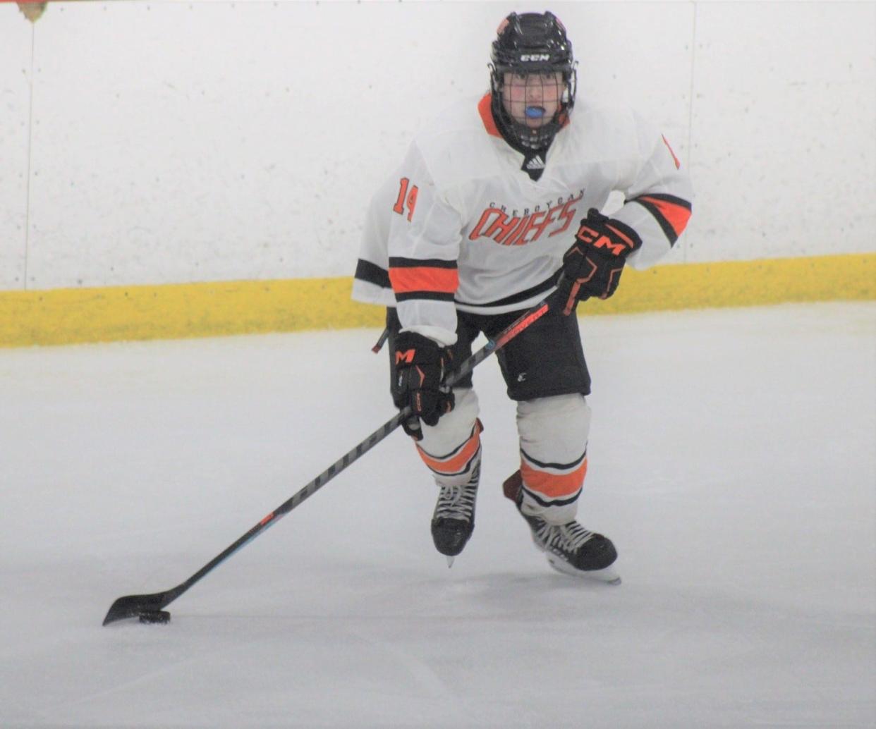 Sophomore Warren Farver (14) scored a goal for the Cheboygan hockey team in its road matchup against Romeo on Saturday, but the Chiefs suffered a 5-2 loss to the Bulldogs.