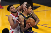 Los Angeles Lakers forward Kyle Kuzma, right, tries to shoot as Houston Rockets forward Anthony Lamb defends during the second half of an NBA basketball game Wednesday, May 12, 2021, in Los Angeles. (AP Photo/Mark J. Terrill)