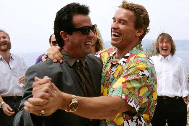 <p>Eric Robert/Sygma/Sygma via Getty</p> Sylvester Stallone and Arnold Schwarzenegger at the 1990 Cannes Film Festival