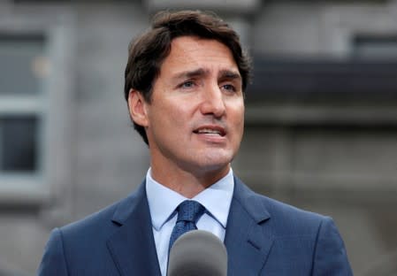 FILE PHOTO: Canada's PM Justin Trudeau speaks during a news conference at Rideau Hall after asking Governor General Julie Payette to dissolve Parliament in Ottawa