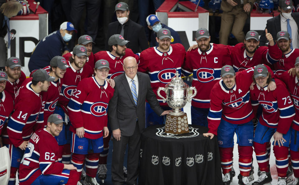 Montreal Canadiens pose with the Clarence Campbell trophy after defeating the Vegas Golden Knights to advance to the Stanley Cup finals following overtime in Game 6 of an NHL hockey Stanley Cup semifinal playoff series Thursday, June 24, 2021 in Montreal. (Ryan Remiorz/The Canadian Press via AP)