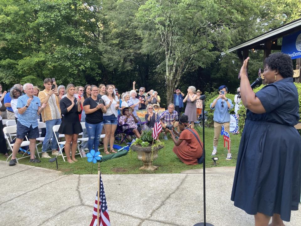 Democrat Stacey Abrams greets supporters of her bid for Georgia governor on Thursday, July 28, 2022, during a rally in Clayton, Ga. (AP Photo/Jeff Amy)