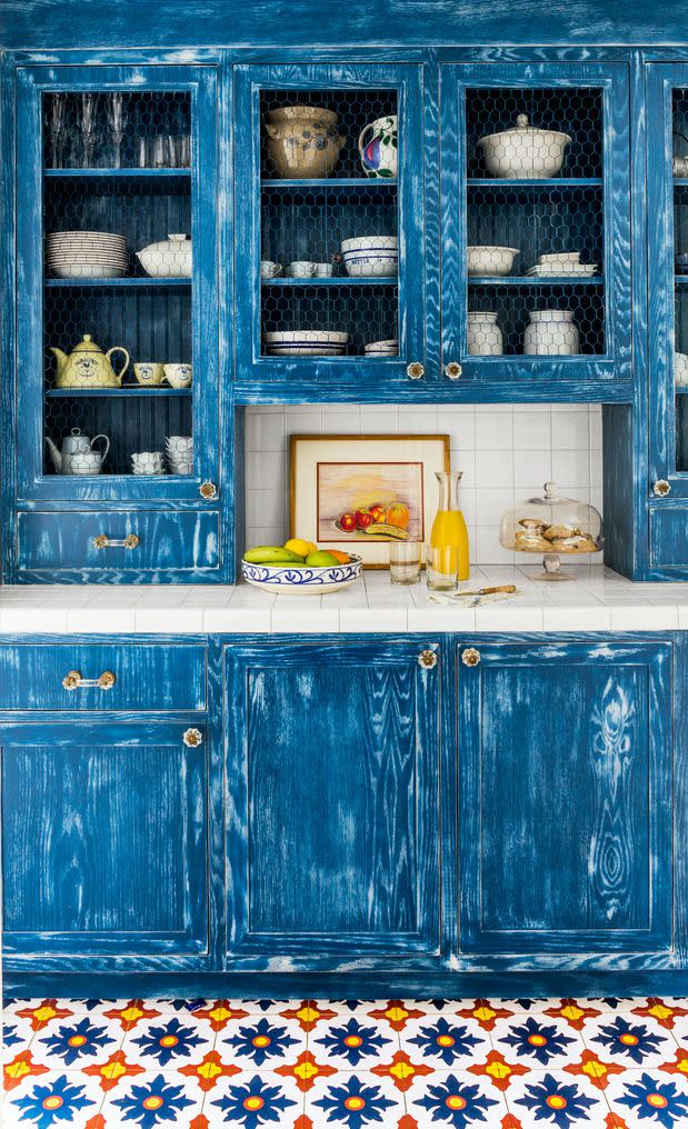 denim blue cabinets by designer maggie cruz