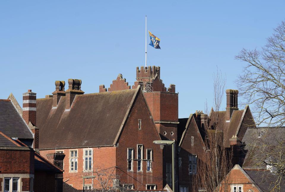 A flag is flown at half-mast at Epsom College in Surrey where the bodies of headmistress Emma Pattison, 45, her daughter Lettie, seven, and her husband George, 39, were found when officers were called to the private school by the South East Coast Ambulance Service at about 1.10am on Sunday morning. Picture date: Monday February 6, 2023.