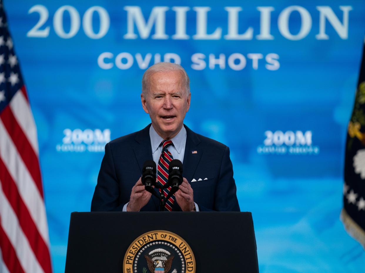 <p>President Joe Biden speaks about COVID-19 vaccinations at the White House, in Washington. Biden spent his first 100 days encouraging Americans to mask up and stay home to slow the spread of Covid-19.</p> ((Associated Press))