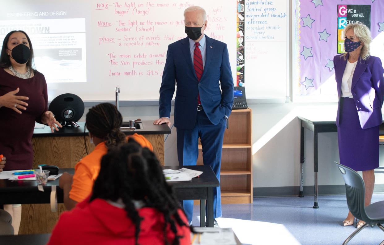 President Biden, alongside with the First Lady, speaks with students in a 6th grade science class, at Brookland Middle School in Washington, DC, September 10, 2021. (Photo by SAUL LOEB / AFP)