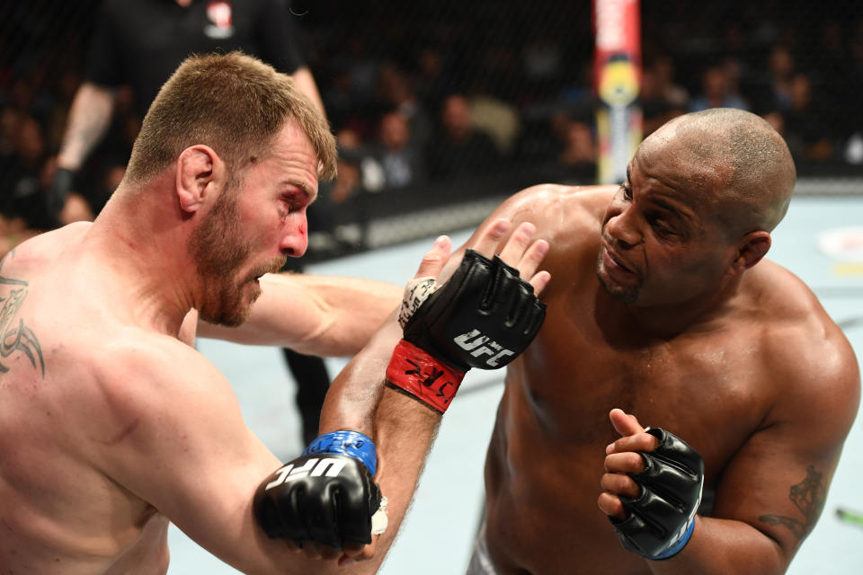 LAS VEGAS, NV - JULY 07:  Daniel Cormier punches Stipe Miocic in their UFC heavyweight championship fight during the UFC 226 event inside T-Mobile Arena on July 7, 2018 in Las Vegas, Nevada.  (Photo by Josh Hedges/Zuffa LLC/Zuffa LLC via Getty Images)