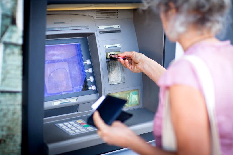 Woman at ATM