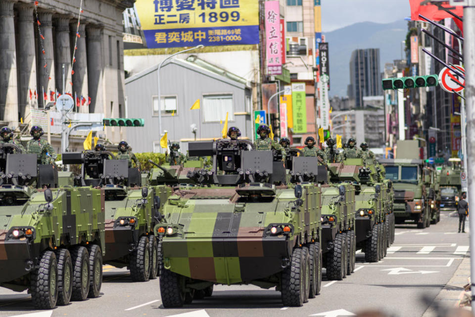 Armoured vehicles from Taiwan military forces parades in front of Taiwan presidential palace on Monday.