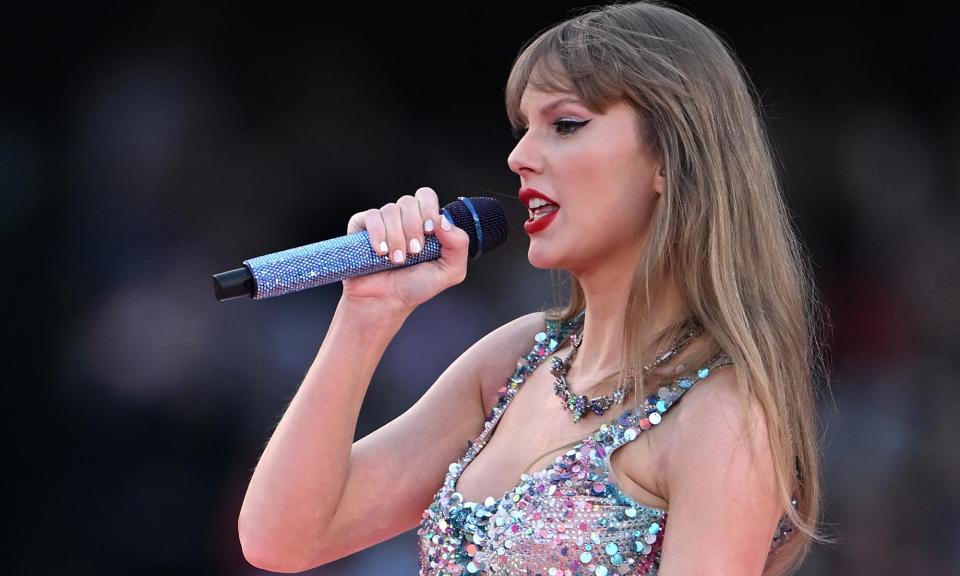 <span>Taylor Swift’s Eras tour was performed to record crowds at the MCG as sporting drama played out nearby at the A-League Men’s derby.</span><span>Photograph: Joel Carrett/AAP</span>