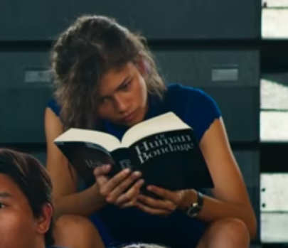 close up of zendaya as MJ reading