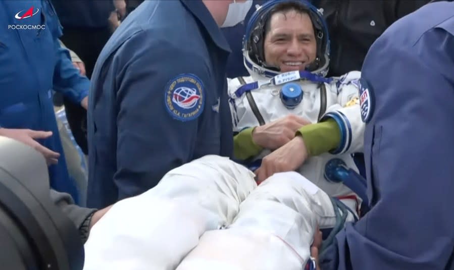 In this photo taken from video released by Roscosmos space corporation, rescue team members carry NASA astronaut Frank Rubio shortly after the landing of the Russian Soyuz MS-23 space capsule about 150 km (90 miles) south-east of the Kazakh town of Zhezkazgan, Kazakhstan, Wednesday, Sept. 27, 2023. The Soyuz capsule carrying NASA astronaut Frank Rubio, Roscosmos cosmonauts <span class="caas-xray-inline-tooltip"><span class="caas-xray-inline caas-xray-entity caas-xray-pill rapid-nonanchor-lt" data-entity-id="Sergey_Prokopyev_(cosmonaut)" data-ylk="cid:Sergey_Prokopyev_(cosmonaut);pos:2;elmt:wiki;sec:pill-inline-entity;elm:pill-inline-text;itc:1;cat:Person;" tabindex="0" aria-haspopup="dialog"><a href="https://search.yahoo.com/search?p=Sergey%20Prokopyev%20(cosmonaut)" data-i13n="cid:Sergey_Prokopyev_(cosmonaut);pos:2;elmt:wiki;sec:pill-inline-entity;elm:pill-inline-text;itc:1;cat:Person;" tabindex="-1" data-ylk="slk:Sergey Prokopyev;cid:Sergey_Prokopyev_(cosmonaut);pos:2;elmt:wiki;sec:pill-inline-entity;elm:pill-inline-text;itc:1;cat:Person;" class="link ">Sergey Prokopyev</a></span></span>, and Dmitri Petelin, touched down on Wednesday on the steppes of Kazakhstan. (Roscosmos space corporation via AP)
