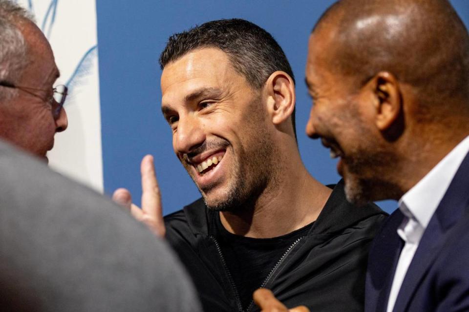 Argentine soccer player Maxi Rodríguez speaks with guests attending the unveiling of the new AFA offices in the Wynwood neighborhood of Miami, Florida, on Thursday, December 7, 2023.