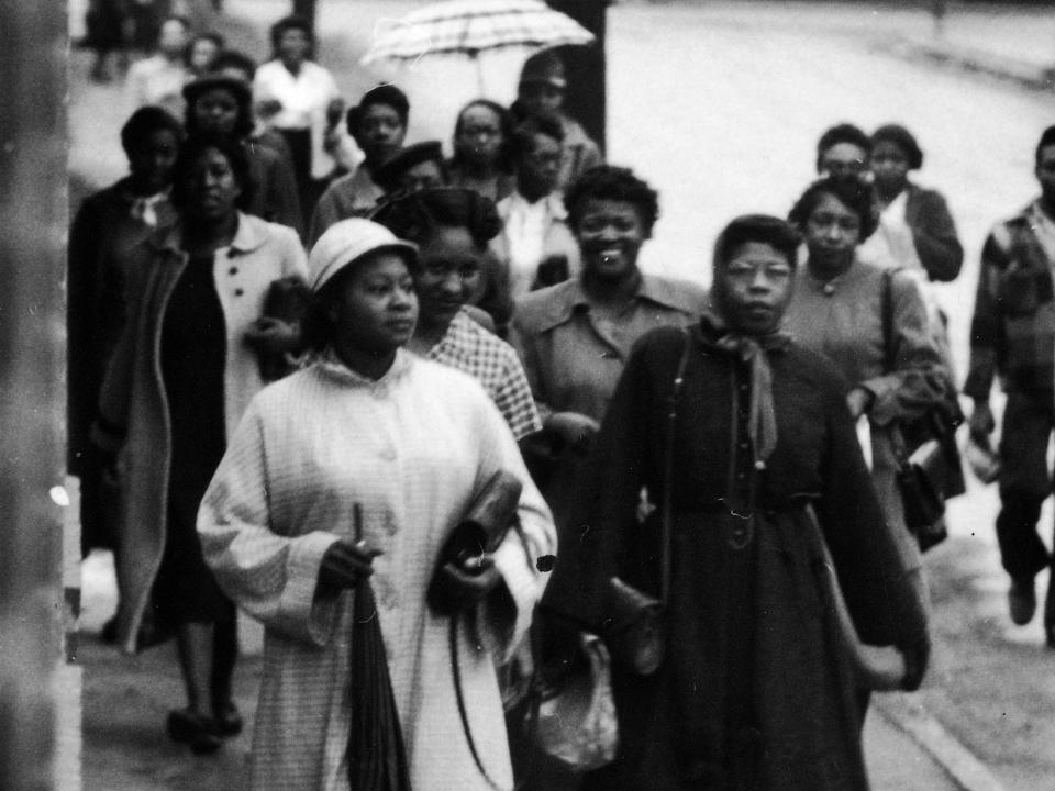 Woman walking to work during the Montgomery Bus Boycott.