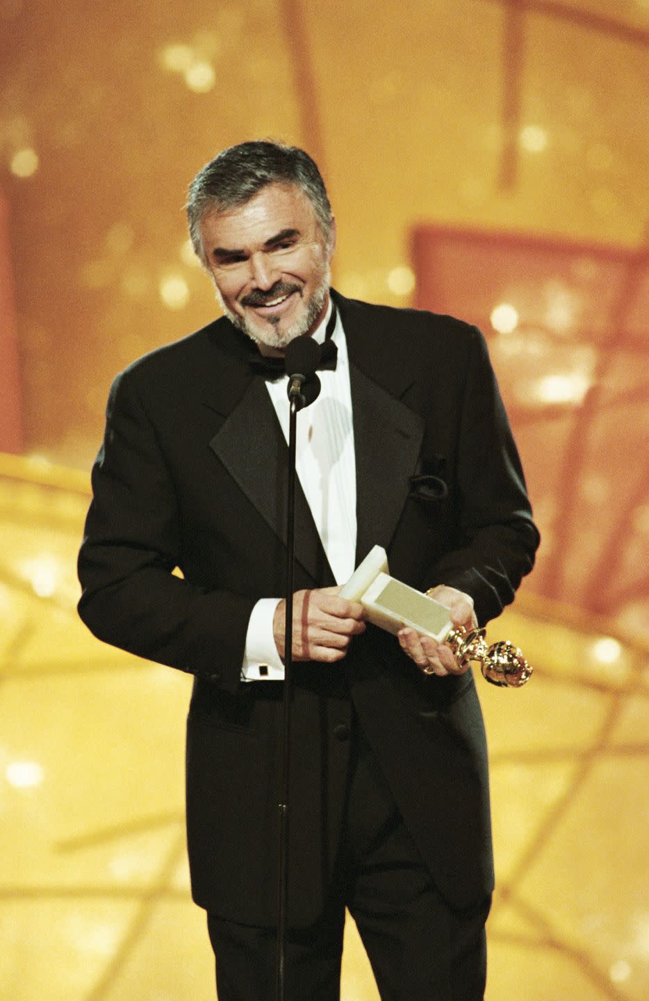 <p>In 1998, a dapper Reynolds accepts his Golden Globe for Best Supporting Actor in <em>Boogie Nights</em>.  </p>