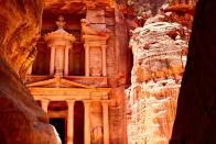 <p>Sci-fi and fantasy directors have long been enamoured with the desert landscapes and exceptional archaeological sites of Jordan. </p><p>Perhaps most famously, many scenes from Indiana Jones and the Last Crusade were filmed in Petra, a fascinating prehistoric city carved into the red and pink sandstone cliff faces of southern Jordan. </p><p>The city is an archaeological jewel and a UNESCO World Heritage Site. It's the lost city of the biblical Nabataean, and here you'll find an impressive series of tombs and dwellings hidden behind ornate facades carved directly into the rock.<br><br>At the climax of The Last Crusade, Harrison Ford and Sean Connery venture deep inside the labyrinths of Al-Khazneh, the Treasury - one of Petra's most magnificent carved buildings - on their famous quest to unearth the Holy Grail. In reality, you can only see the Treasury from the outside, with the inside being an empty chamber once used as a tomb.</p><p>Nevertheless, the façade of this elaborate temple is incredible to see, a true testament to the creative engineering genius of the Nabataeans.<br></p><p><strong>How to visit: </strong>Experience a very <a href="https://www.goodhousekeepingholidays.com/tours/jordan-women-only-adventure-tour" rel="nofollow noopener" target="_blank" data-ylk="slk:special trip to Jordan;elm:context_link;itc:0;sec:content-canvas" class="link ">special trip to Jordan</a> in November 2023, which will take you to Petra, where you'll see the ancient city's astonishing monuments by candlelight. </p><p>This women-only adventure includes a visit the Wadi Rum Desert, whose mesmerising terrains have been used as the setting for many movies, including scenes from the blockbuster Dune.</p><p><a class="link " href="https://www.goodhousekeepingholidays.com/tours/jordan-women-only-adventure-tour" rel="nofollow noopener" target="_blank" data-ylk="slk:FIND OUT MORE;elm:context_link;itc:0;sec:content-canvas">FIND OUT MORE</a> </p>