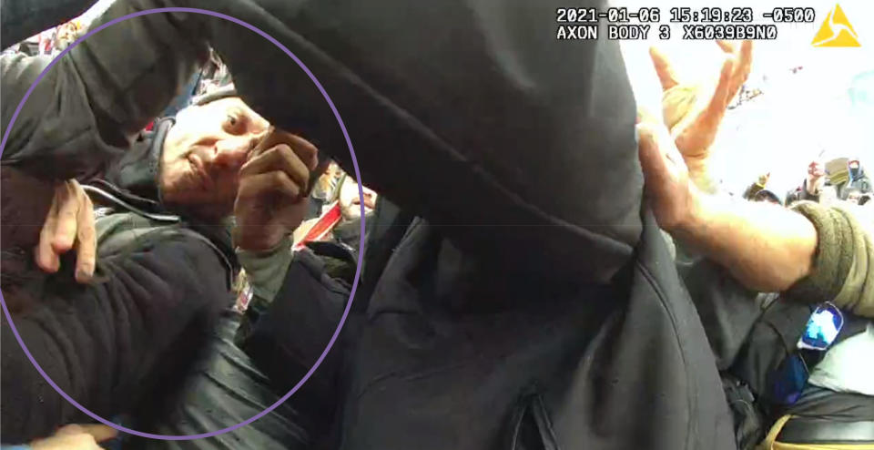 File: This image from the body-worn camera of Washington Metropolitan Police Department officer Michael Fanone shows Thomas Sibick, circled by the Justice Department, at left, during the riot at the U.S. Capitol on Jan. 6.  / Credit: Justice Department via AP