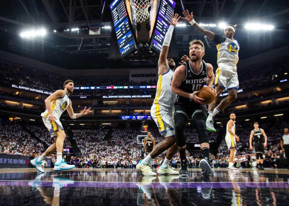 Sacramento Kings center Domantas Sabonis (10) readies to go up for a shot during the first half against the Golden State Warriors during Game 1 of the first-round NBA basketball playoff series at Golden 1 Center on Saturday, April 15, 2023.