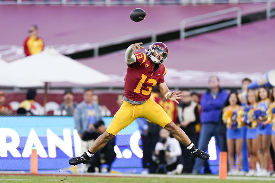 FILE - Southern California quarterback Caleb Williams throws a pass during the second half of the team's NCAA college football game against UCLA, Saturday, Nov. 18, 2023, in Los Angeles. Williams is expected to be taken in the first round of the NFL Draft. (AP Photo/Ryan Sun, File)