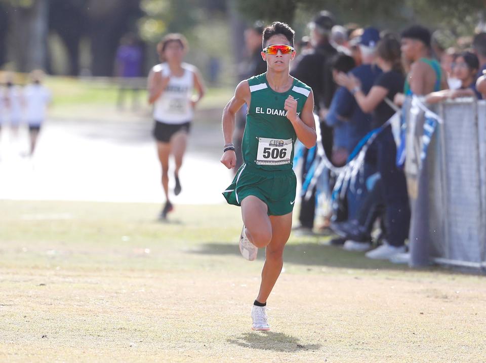 El Diamante's Devin Ibarra races to a first place during the Central Section Cross Country Championships at Woodward Park in Fresno, Calif., Thursday, Nov. 16, 2023.