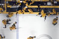 May 22, 2017; Nashville, TN, USA; Nashville Predators players leave the bench over the boards following a 6-3 win against the Anaheim Ducks in game six of the Western Conference Final of the 2017 Stanley Cup Playoffs at Bridgestone Arena. Mandatory Credit: Christopher Hanewinckel-USA TODAY Sports