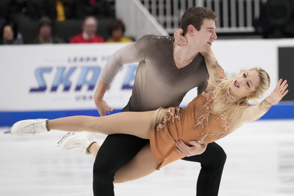 Brandon Frazier, top, and Alexa Knierim perform during the pairs free skate at the U.S. figure skating championships in San Jose, Calif., Saturday, Jan. 28, 2023. (AP Photo/Tony Avelar)