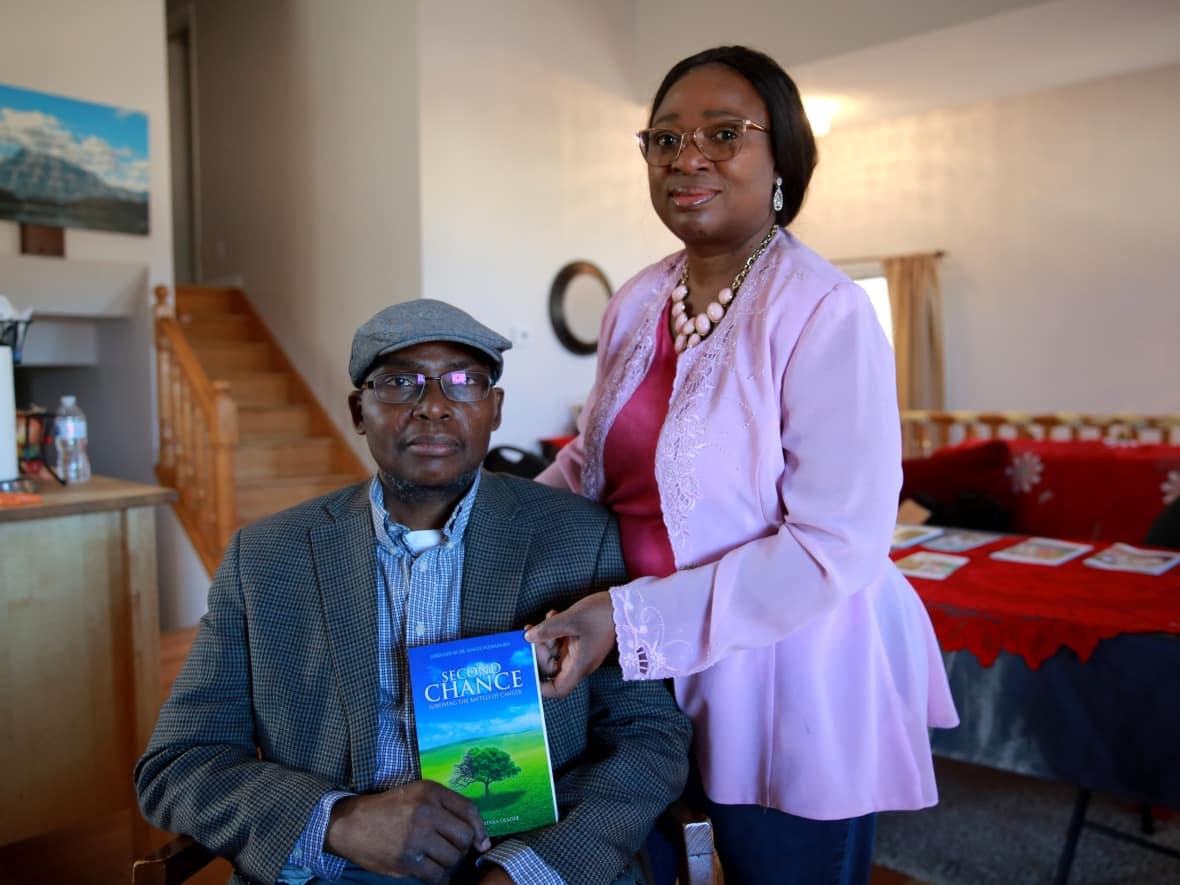 Bayo, left, and Yinka Oladele are the founders of the African Cancer Support Group. After Bayo was diagnosed with cancer, the couple wrote the book Second Chance based on their experience, which inspired the creation of the organization. (Ose Irete/CBC - image credit)