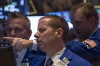 Traders work on the floor of the New York Stock Exchange, November 14, 2013. REUTERS/Brendan McDermid