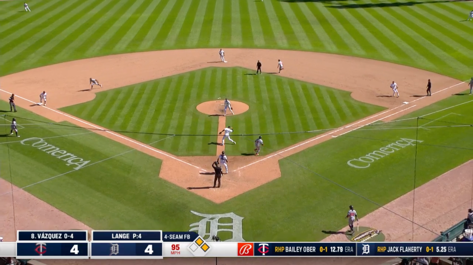 Detroit Tigers first baseman Spencer Torkelson tries to throw out the runner advancing to third base instead of getting the out at first base in the 12th inning April 13, 2024, against the Minnesota Twins at Comerica Park.