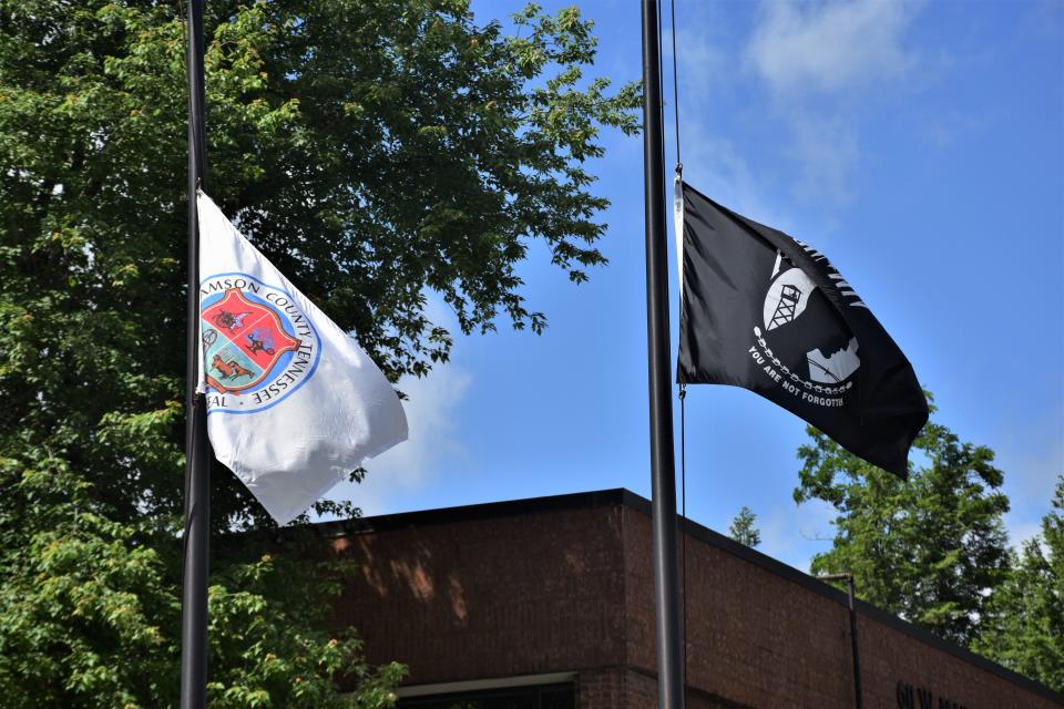 Flags fly at half-staff in honor of Memorial Day this year in downtown Franklin.