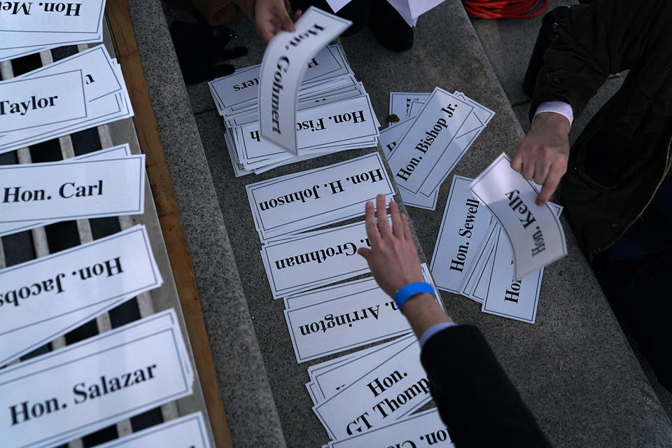 <p>Guest name tags for seating assignments are organized outside the U.S. Capitol on Wednesday. </p>