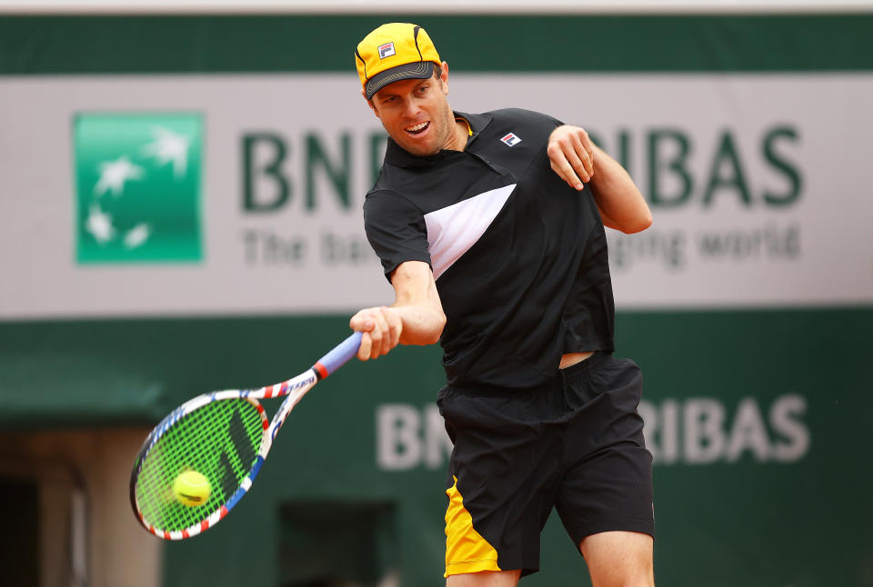 PARIS, FRANCE - SEPTEMBER 29: Sam Querrey of the United States plays a forehand during his Men's Singles first round match against Andrey Rublev of Russia on day three of the 2020 French Open at Roland Garros on September 29, 2020 in Paris, France. (Photo by Julian Finney/Getty Images)