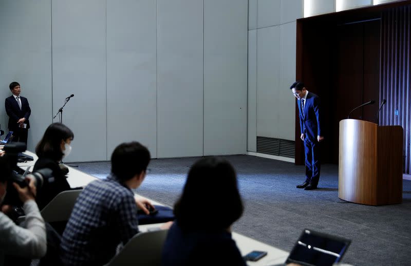 Samsung Electronics Vice Chairman, Jay Y. Lee, bows during a news conference at a company's office building in Seoul