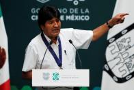 Bolivia's ousted president Evo Morales speaks after receiving a distinguished guest recognition by Mexico's government, at the town hall, in Mexico City