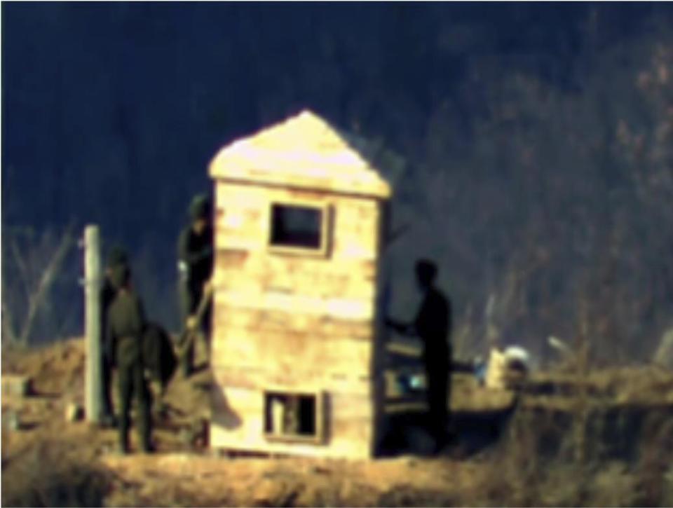 In this undated photo provided and released on Nov. 27, 2023, by South Korea Defense Ministry, North Korean soldiers install their guard post in the Demilitarized Zone (DMZ) in North Korea. (South Korea Defense Ministry via AP)