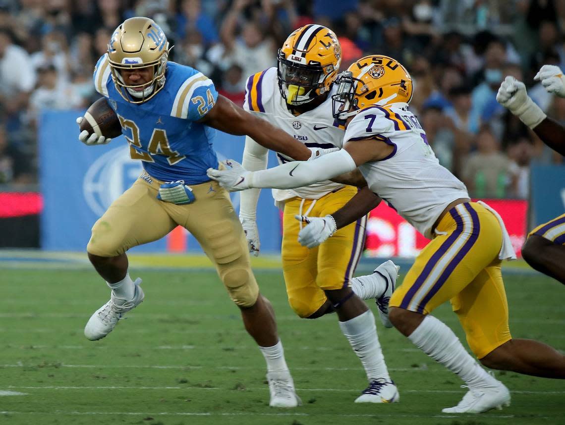 UCLA running back Zach Charbonnet (24) breaks free a long gain against LSU in the second quarter at the Rose Bowl in Pasadena, Calif., on Saturday, Sept. 4, 2021. UCLA won, 38-27. (Luis Sinco/Los Angeles Times/TNS)