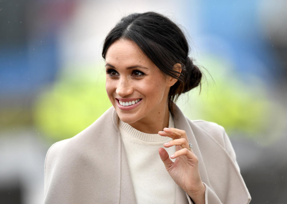meghan markle wearing a cream-colored top