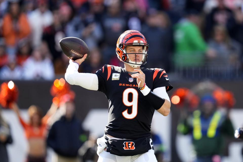 Cincinnati Bengals quarterback Joe Burrow throws a pass against the Houston Texans during the first half of an NFL football game Sunday, Nov. 12, 2023, in Cincinnati. (AP Photo/Michael Conroy)