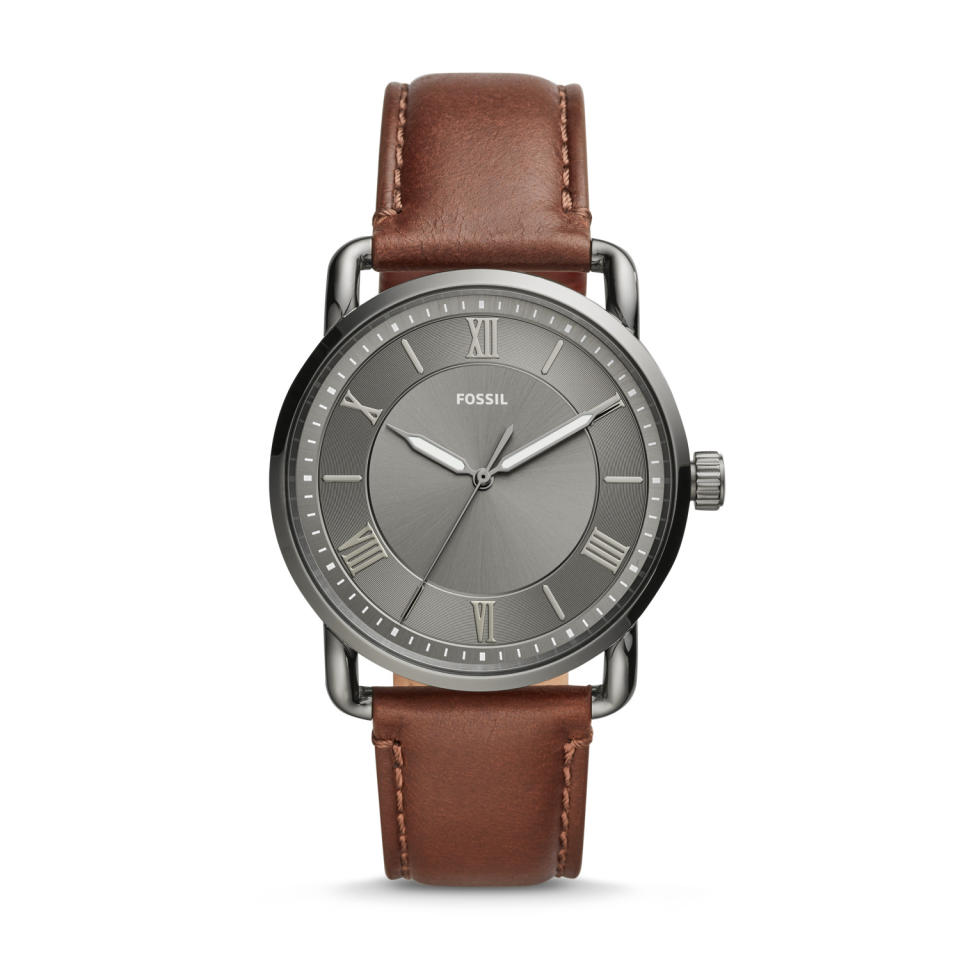 Featuring a gray sun ray dial and a smooth leather strap, this watch is the perfect accessory for any outfit. (Photo: Fossil)