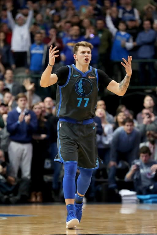 Dallas rookie Luka Doncic reacts in the final seconds of the Mavericks' NBA win over the Golden State Warriors